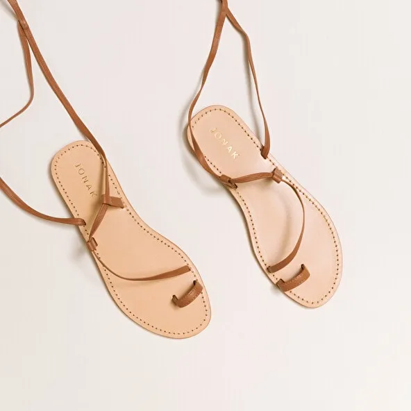 cross-strap sandals in camel leather